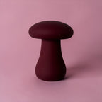 Soft Silicone paddenstoel mini vibrator in bordeauxrood, gemaakt van body-safe siliconen met een fluweelzachte finish. Vlak design voor brede stimulatie.